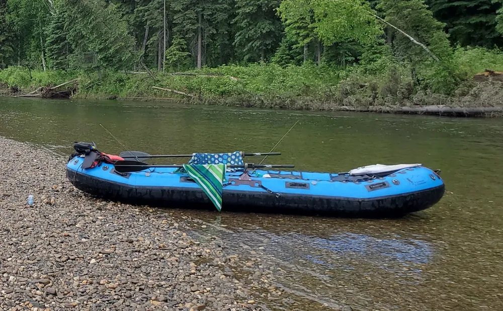 Inflatable raft on the bank of an Alaska river